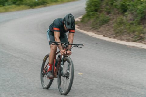 Cyclist Riding curve of downhill ride for cycling training plan