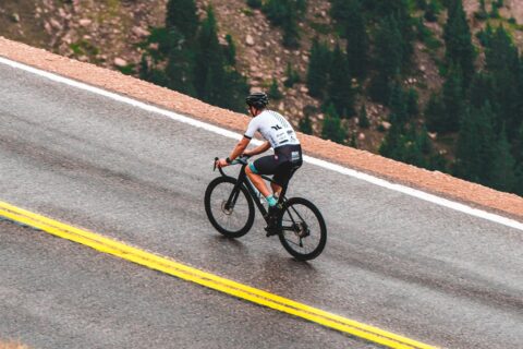 Cyclist climbing a mountain road