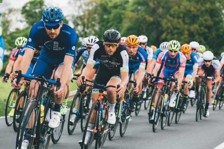 Tight group of cyclists in a race