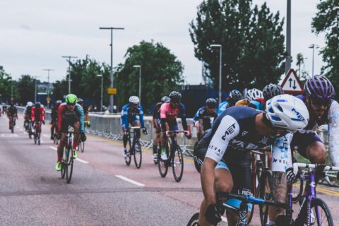 group of riders with two in active pass