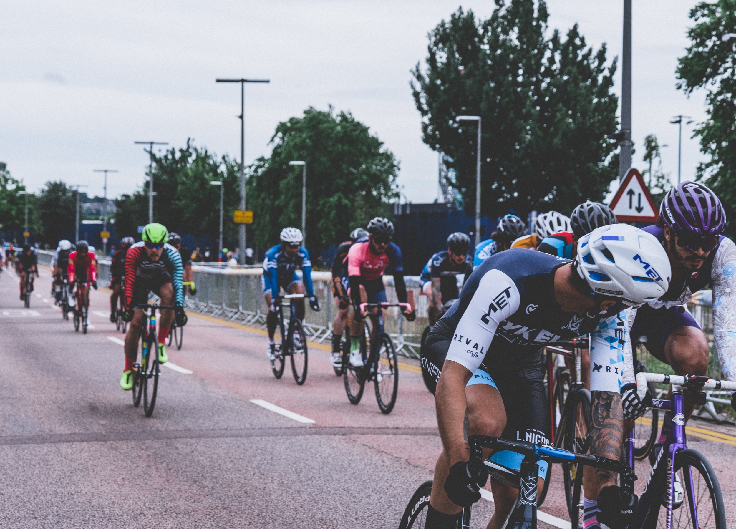 group of riders with two in active pass