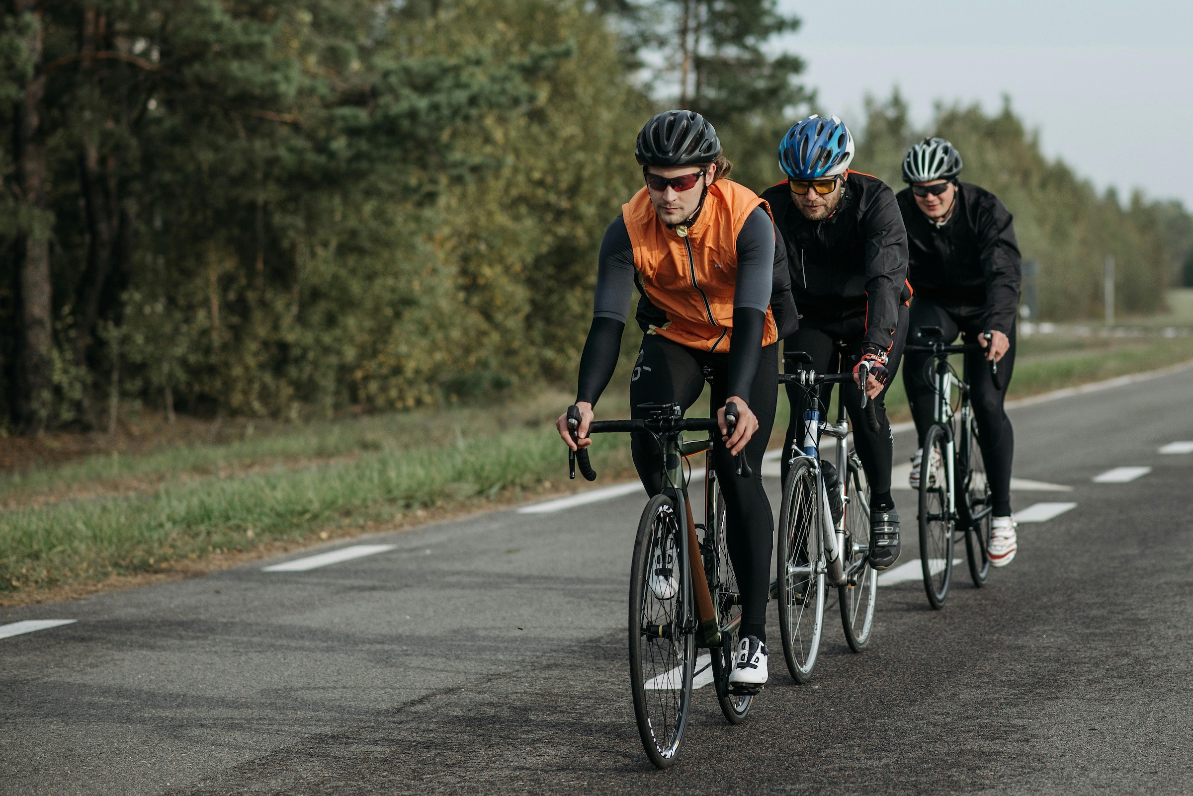 Three Cyclists riding in line for recent nerd lab physiology research