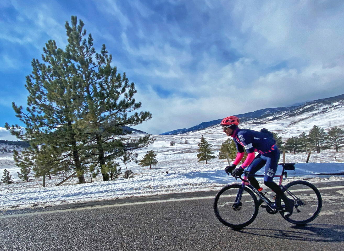 Lachlan Morton riding in the snow