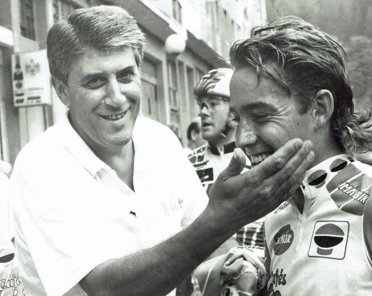 A young Jeff Winkler and his mullet being congratulated by a coach