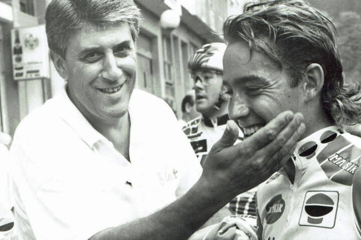 A young Jeff Winkler and his mullet being congratulated by a coach