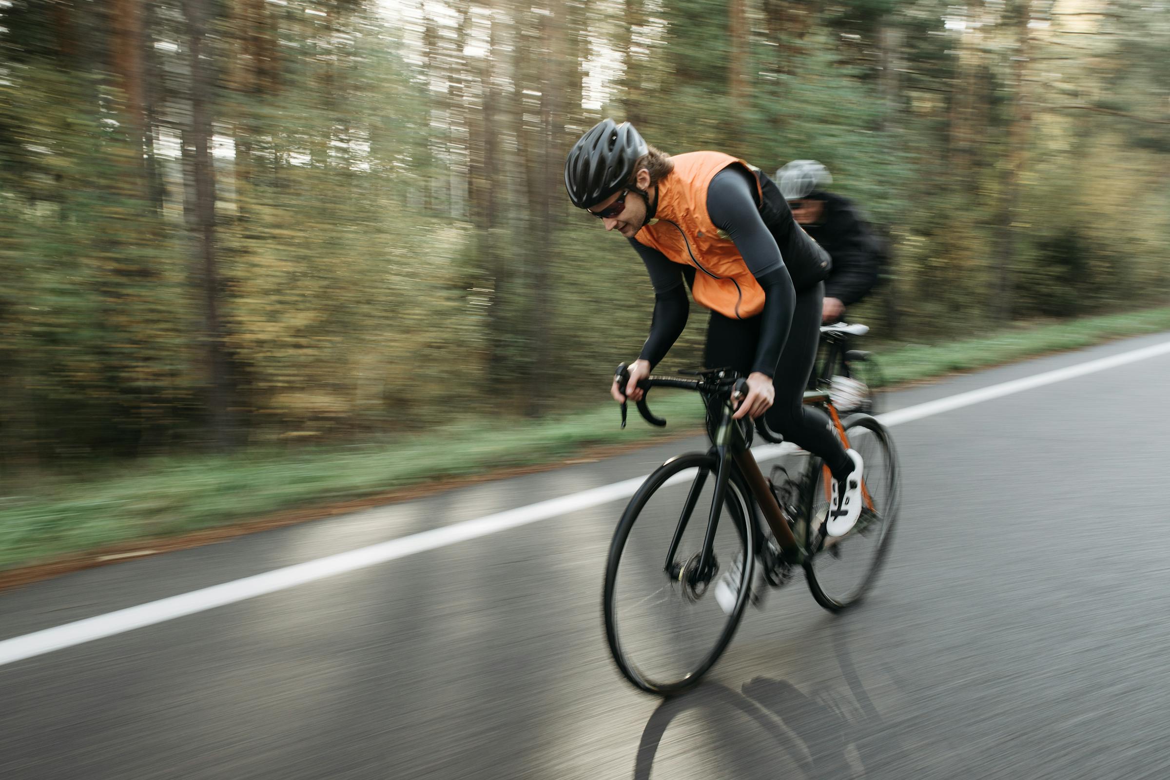 Cyclist pushing hard during interval training
