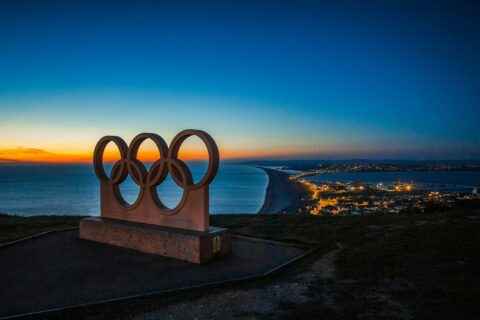 Olympic rings before a sunset