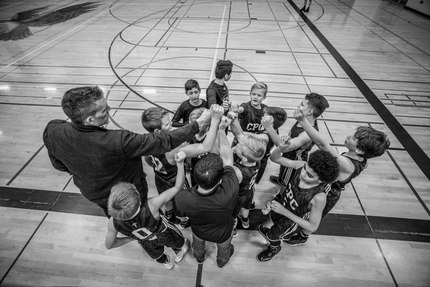 coach and youth basketball team