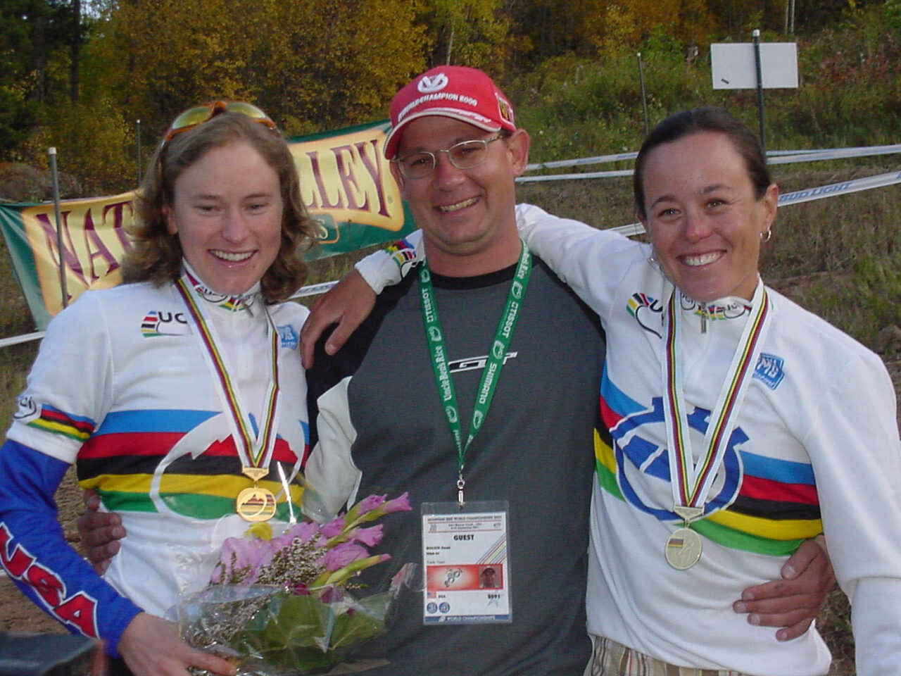 photo of cycling coach Dean Golich with world-champion athletes, Allison Dunlap and Mari Holden