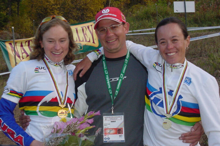 photo of cycling coach Dean Golich with world-champion athletes, Allison Dunlap and Mari Holden