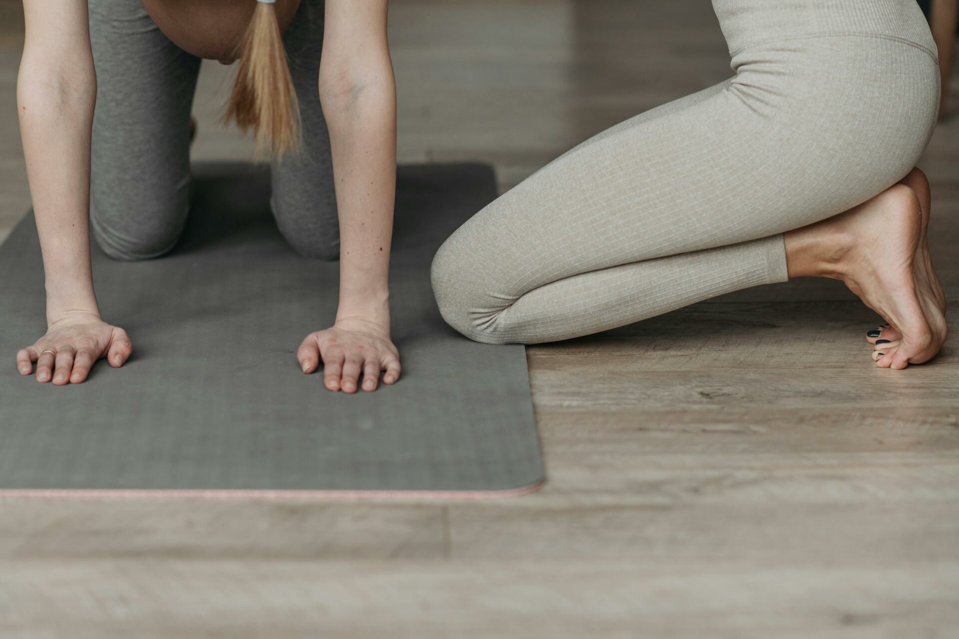 coach with a yoga student