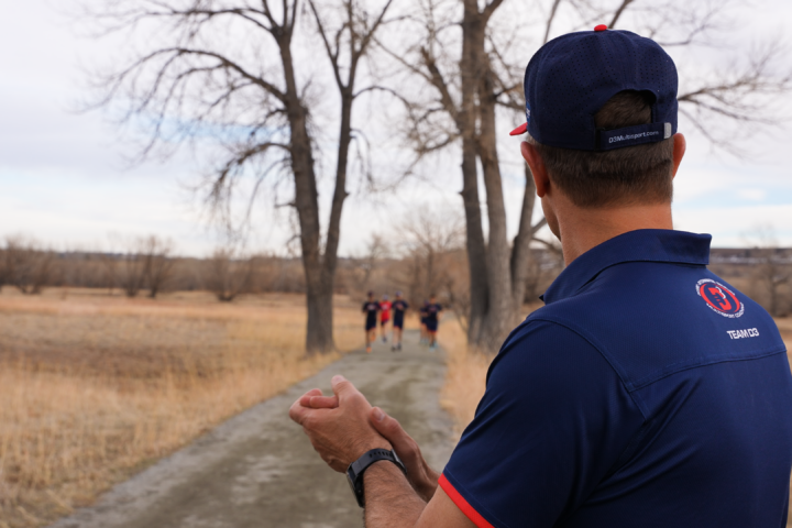 Coach Mike Ricci coaching triathletes