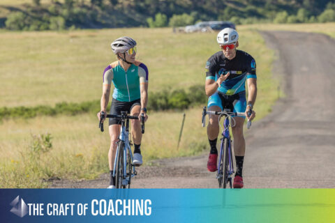 photo of coach and athlete on a training ride.