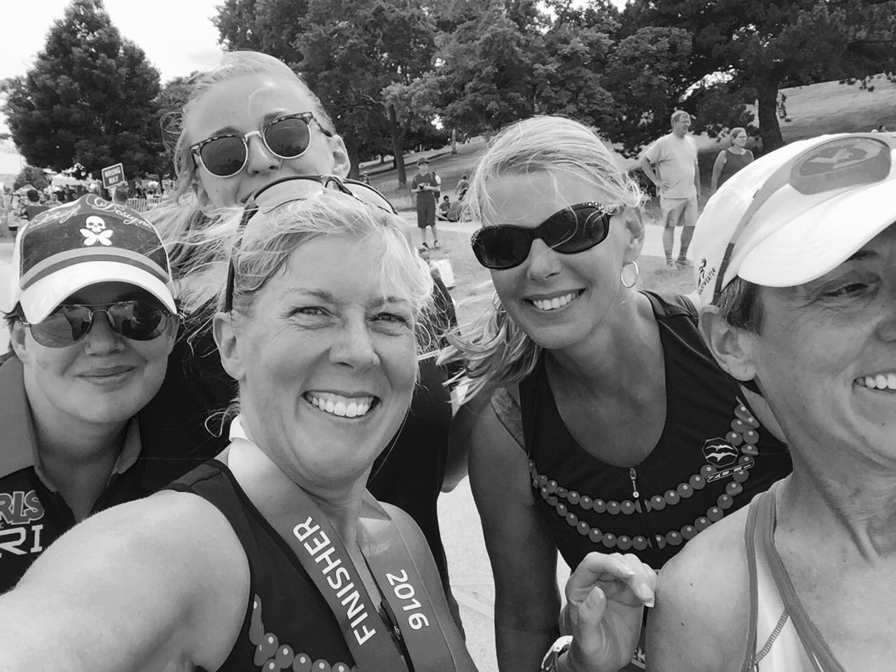 Black and white image of Christine Schirtzinger in a race with her athletes