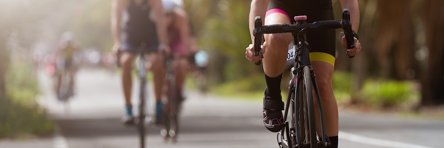 female cyclist riding bike