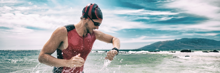 triathlete checking his watch