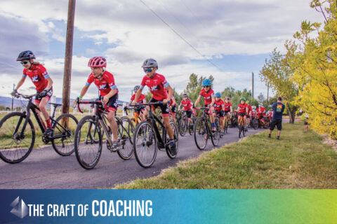 photo of junior cycling team riding together
