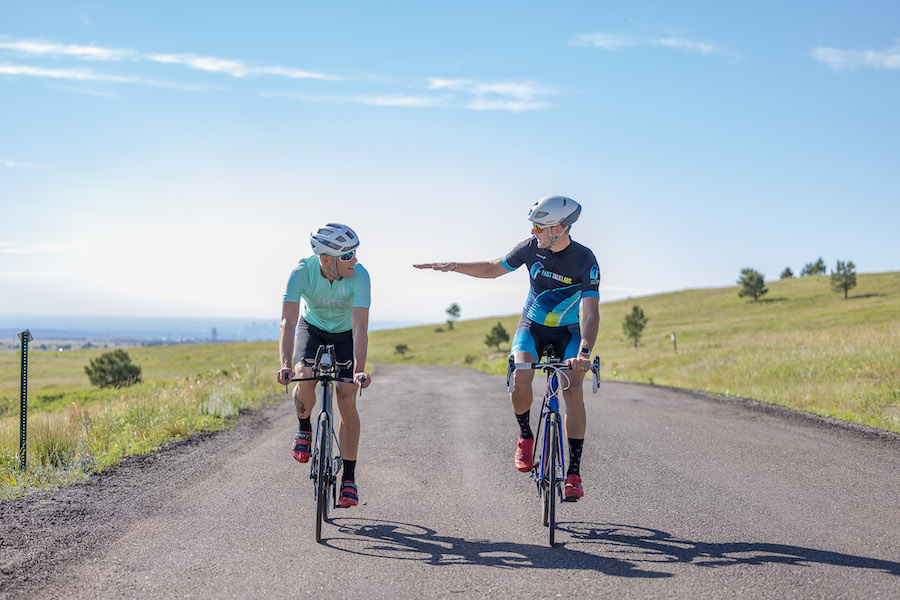 How to get started with polarized training. Coach Ryan Kohler with triathlete riding bikes.