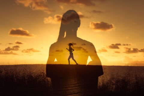 Composite image of a woman running at sunset through a silhouette of her sitting