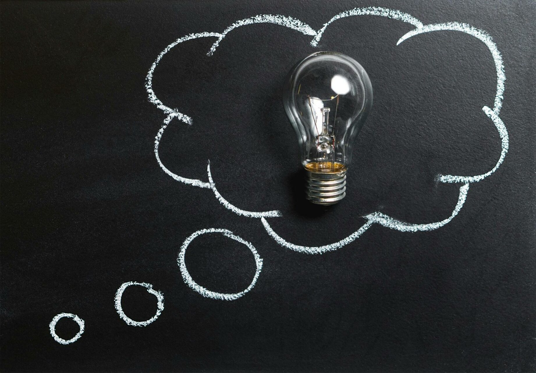 Lightbulb and chalkboard