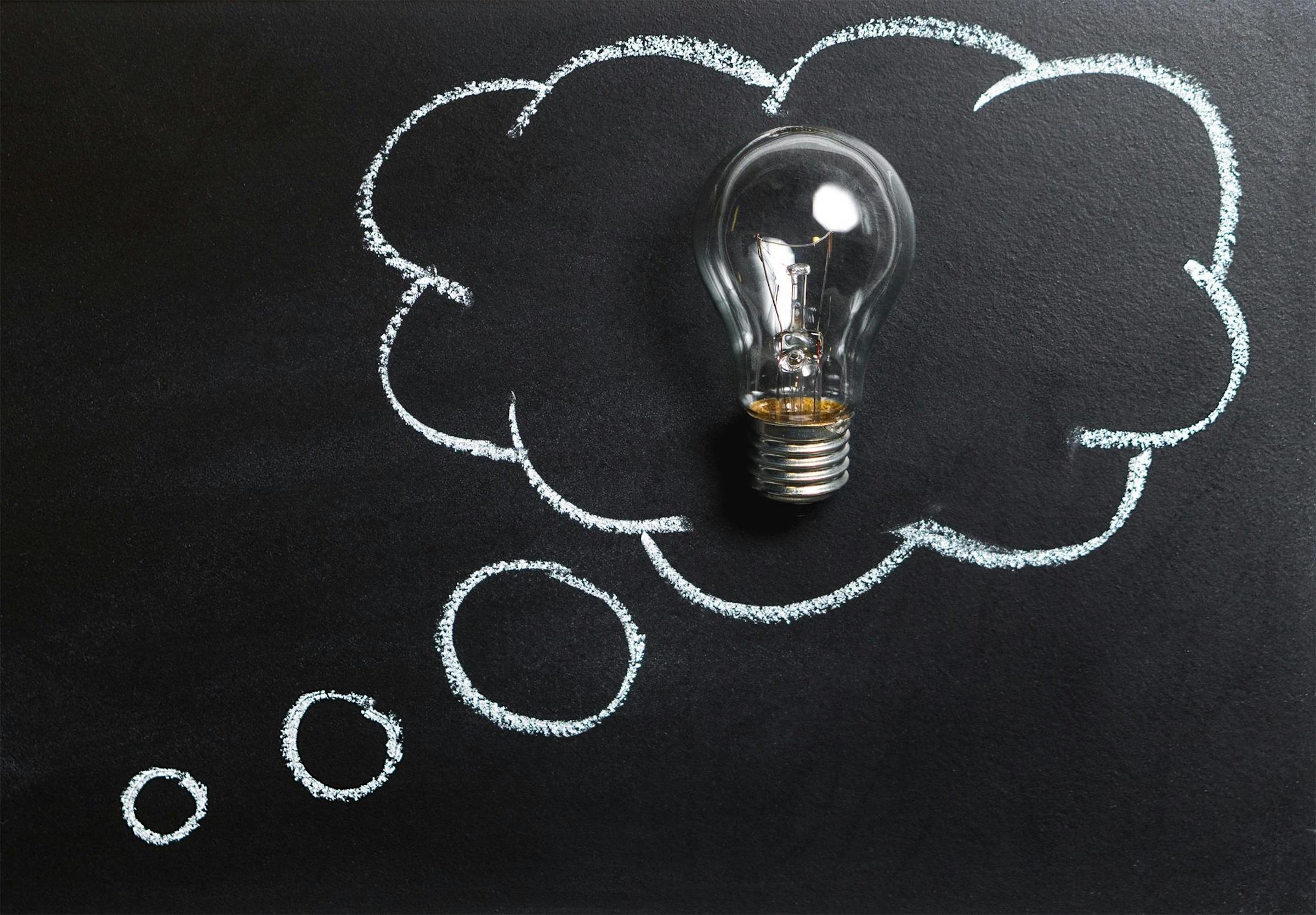 Lightbulb and chalkboard