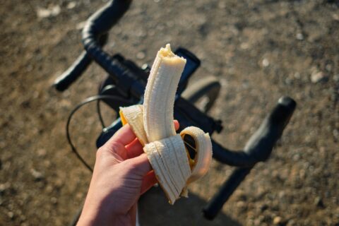 First-person POV eating a banana on a bike ride