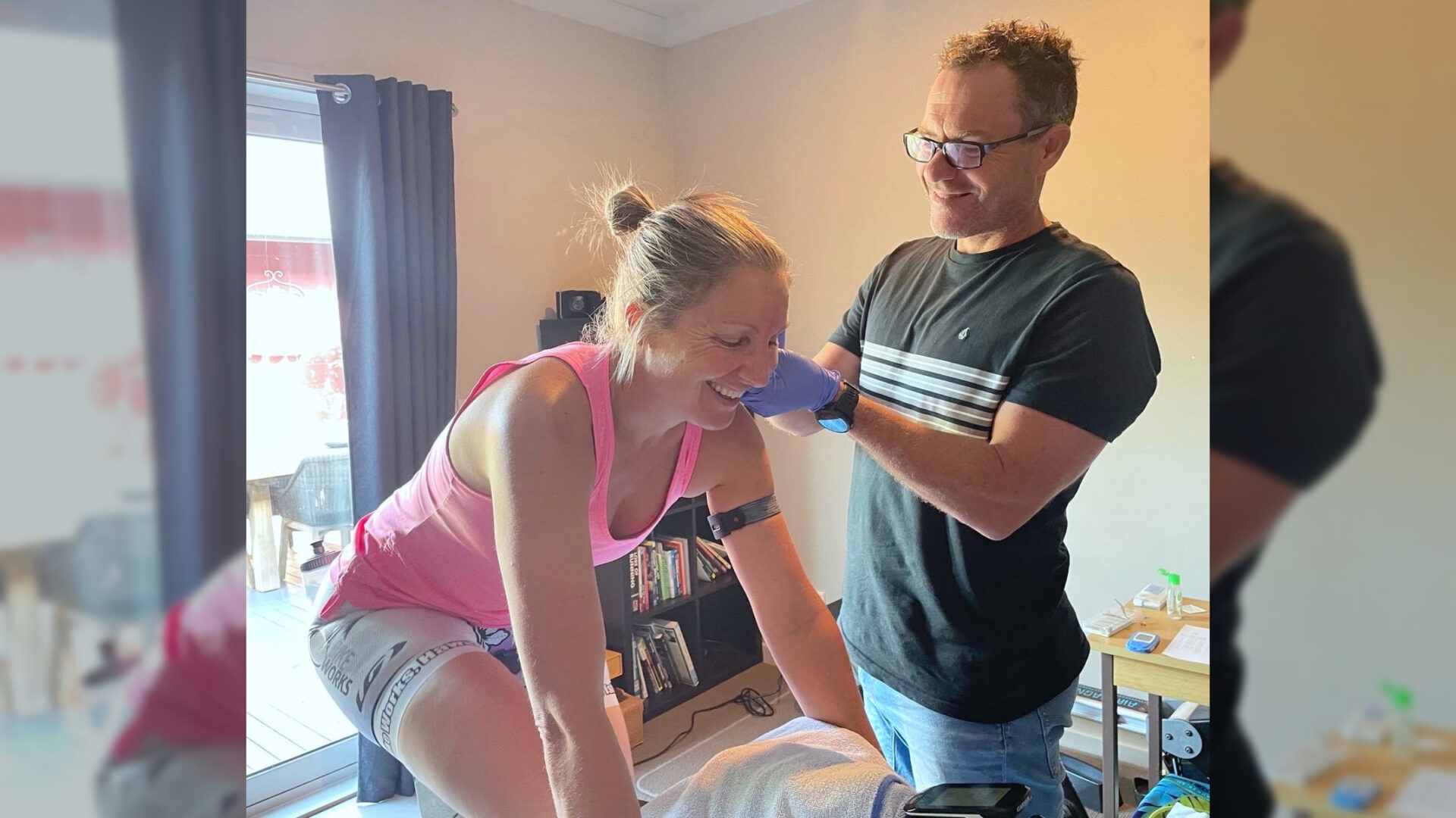 Bevan McKinnon performing a lactate test on a female athlete