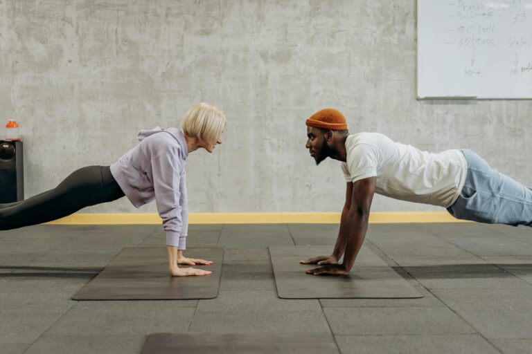 Male coach with female athlete