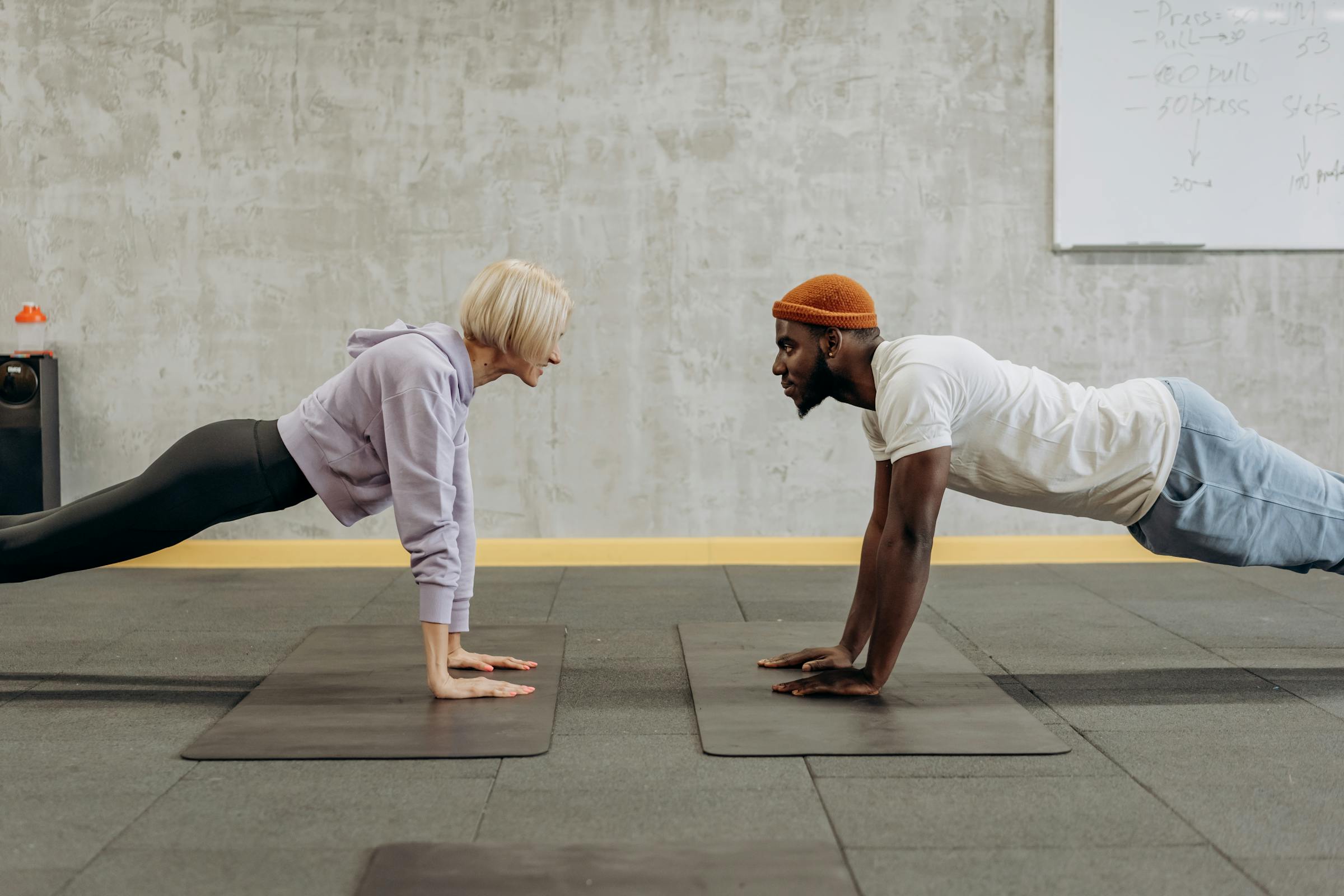 Male coach with female athlete