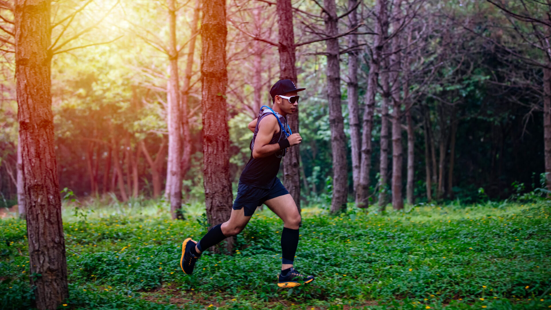 Ultra-endurance athlete running through the woods