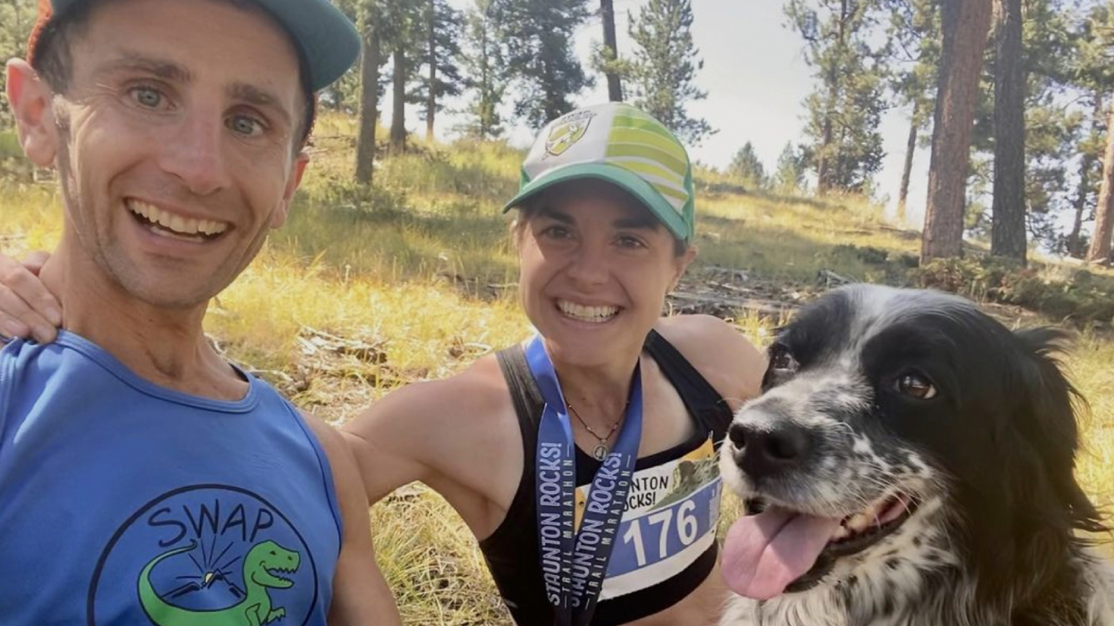 David and Megan Roche on a trail with their dog.