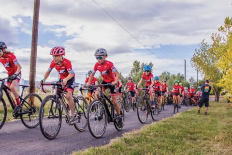Boulder Junior Cycling riders compete during a bike race.