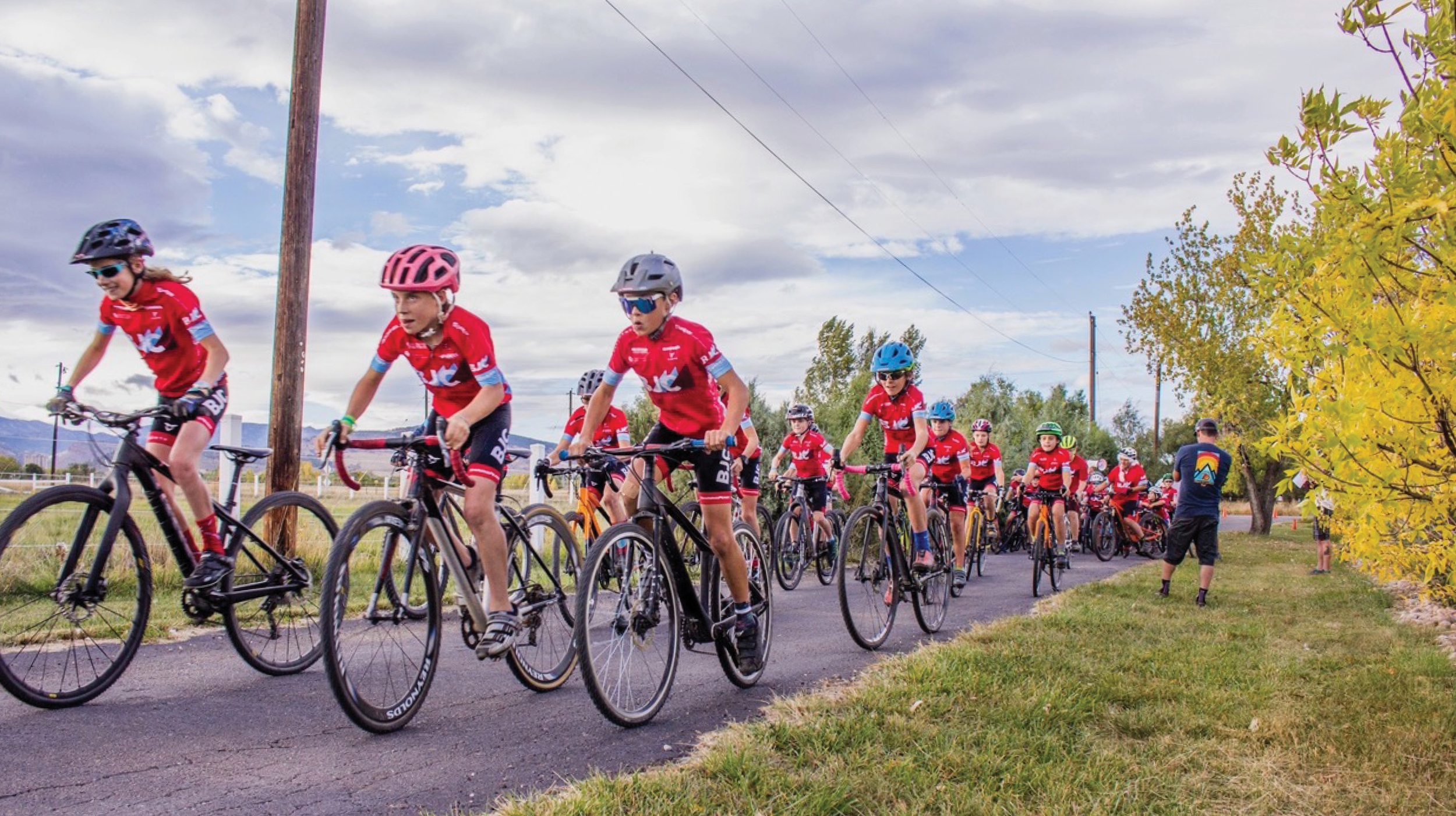 Boulder Junior Cycling riders compete during a bike race.