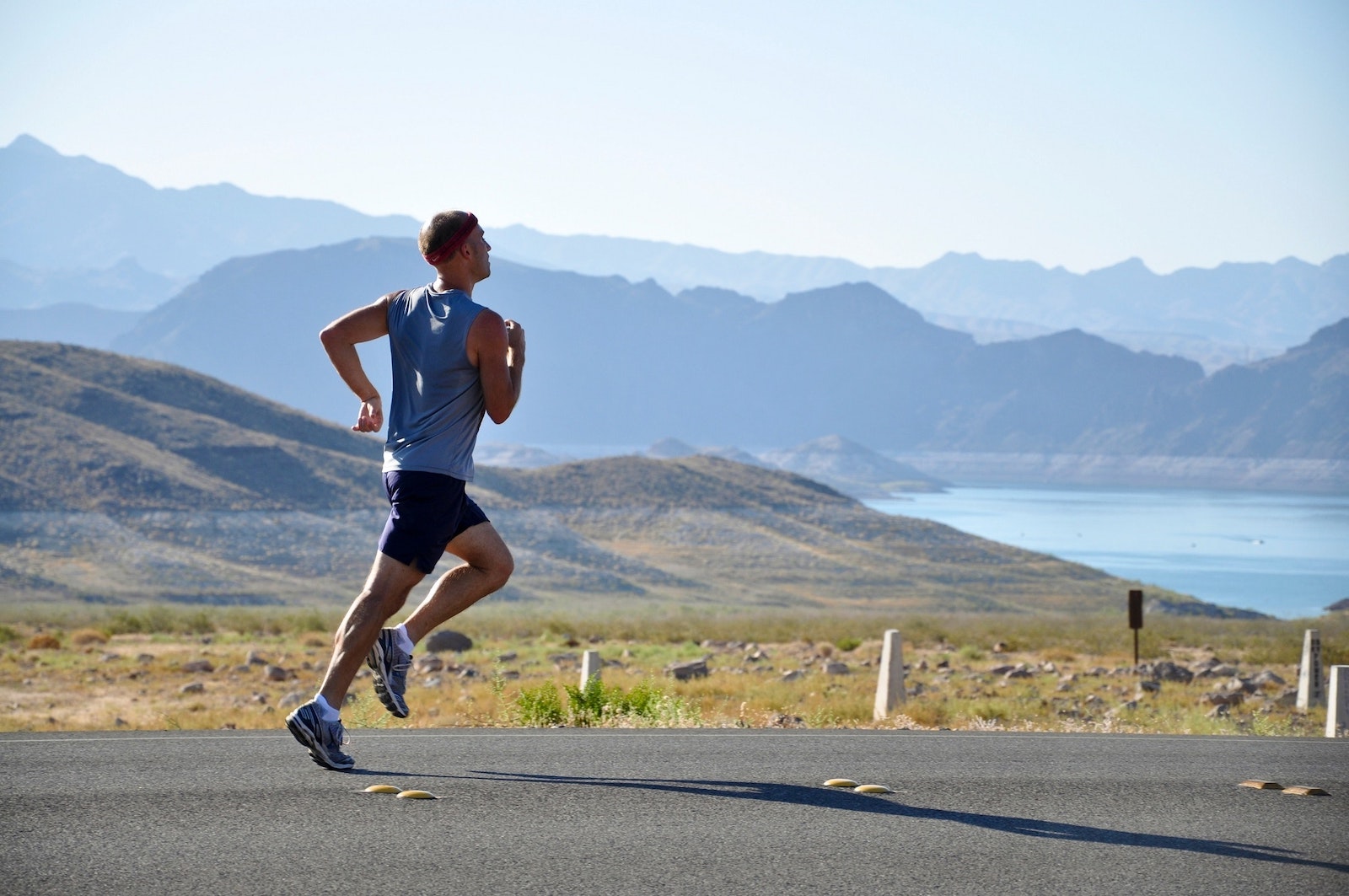 man running in a hazy landscape