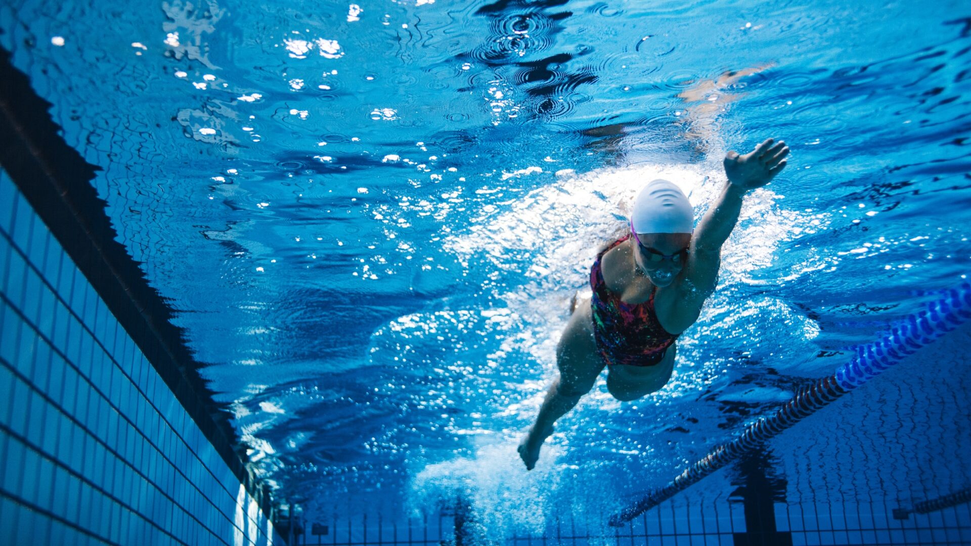 Underwater shot of a woman swimming laps