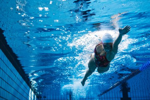 Underwater shot of a woman swimming laps