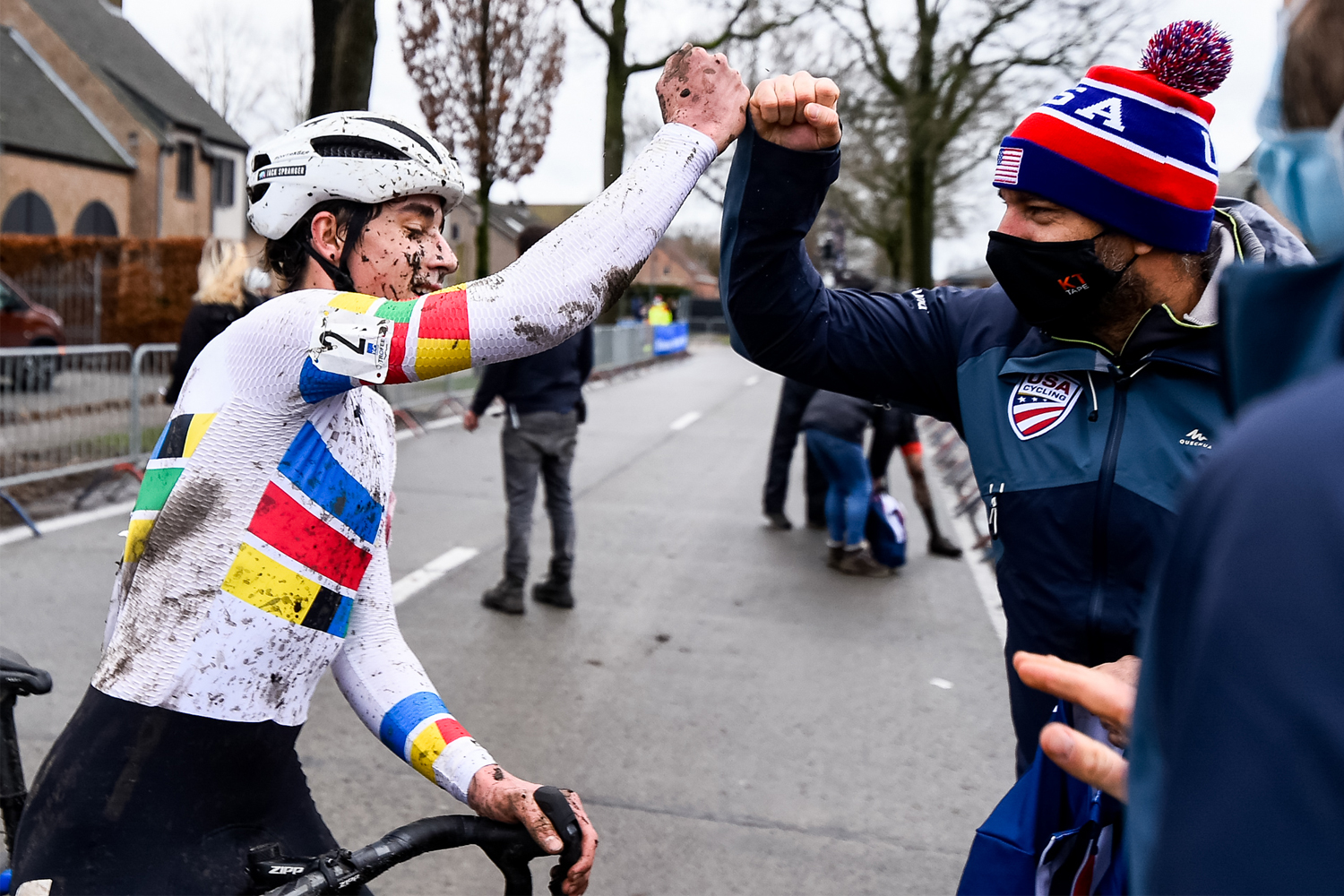 USA Cycling coach celebrates with cyclocross athlete