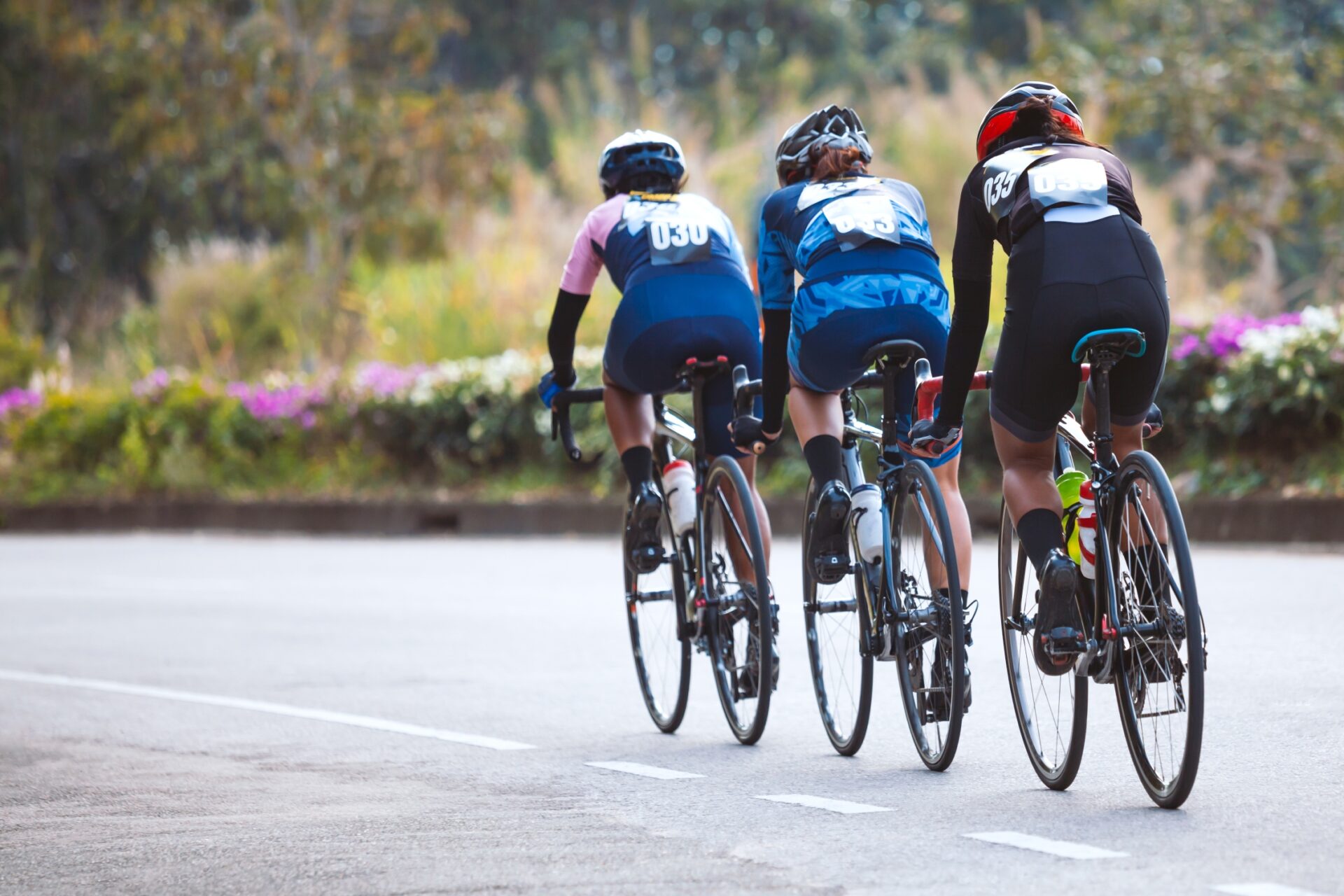 Three female cyclists in a pace line