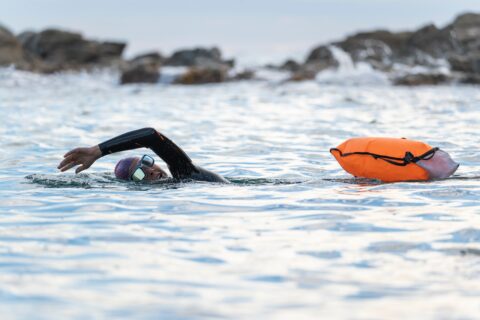 Open-water swimming safety, swimmer with buoy