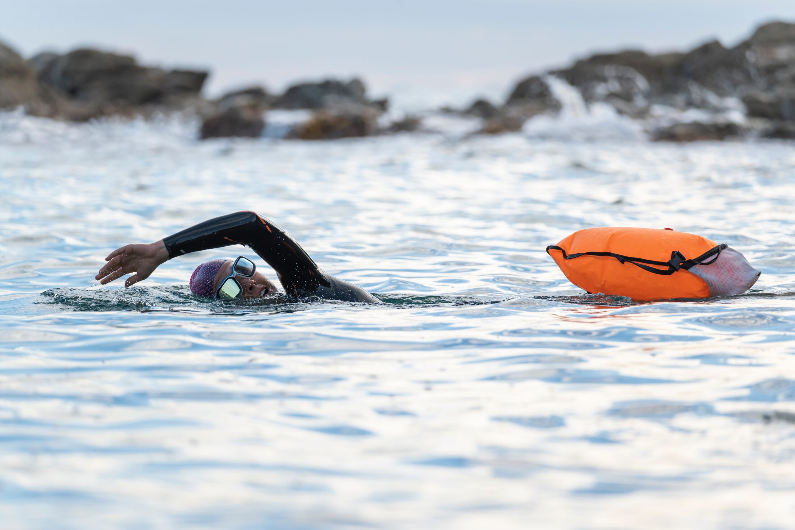 Open-water swimming safety, swimmer with buoy