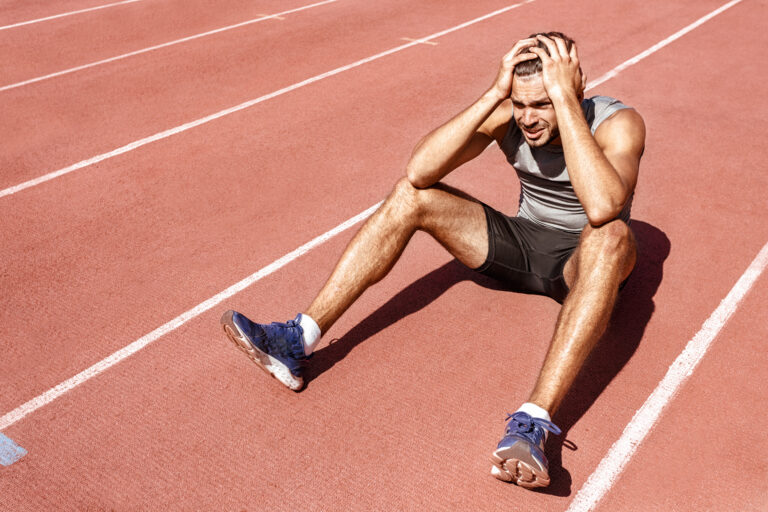 Athlete after a bad race dealing with the pain of crushed expectations.